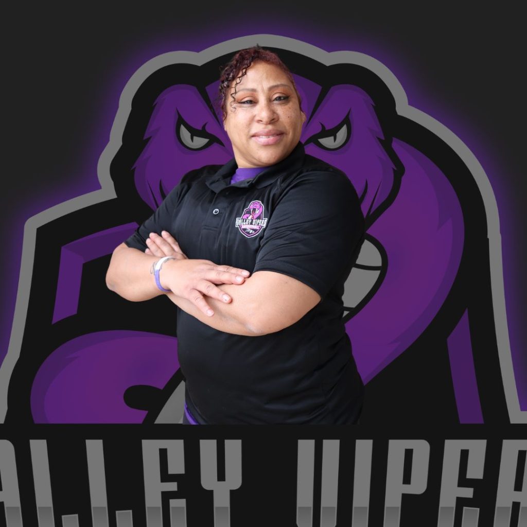 Photo of Tina Culbreath against a Vipers logo backdrop.
