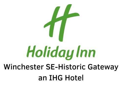 A logo for Holiday Inn. A green stylized H is centered above the words "Holiday Inn. Winchester Southeast-Historic Gateway. An IHG Hotel.